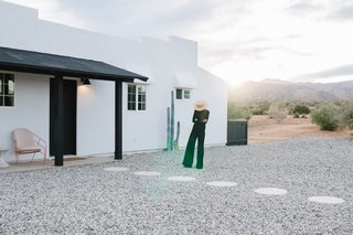 Naude and Brown took notes from legendary designers Luis Barragán, Jacques Grange, and Terence Conran for Casa Mami. Lounge chairs and the Confetti table from LAUN adorn the entry.