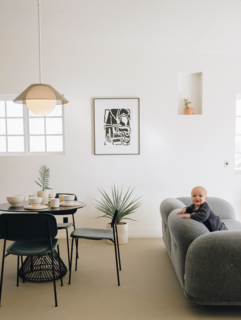 Rico lounges in Marcel Wanders’ Cloud Sofa from Moooi.