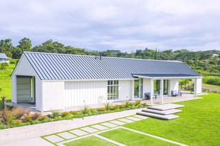 Inspired by the Scandinavian barn vernacular, this Upcountry Maui cottage provides a peaceful retreat for family gatherings. 
