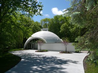 Neatly tucked in Northwest Midland, this eclectic residence was designed in the 1960s by Robert E. Schwartz, a student of Buckminster Fuller. Commonly known as the Dome Home, the shell of the house was made from a spiral-generated styrofoam constructed with Dow Chemical technology.