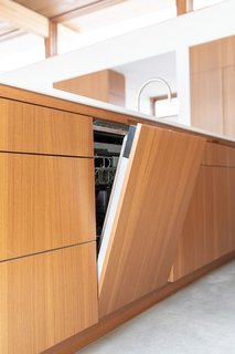 To complement the sleek, clean aesthetic of the kitchen, Joel and Meelena heavily relied on Dacor for appliances. "One of the great things about working with Dacor is how they transform really high-quality kitchen equipment into casework—and as an architect, that’s really exciting," Joel adds.
