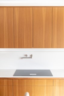 "We made a commitment that we wouldn’t have any fossil fuels in the house, so we knew we wanted an electric range and this was the way to go," Joel explains. "The beauty of the Dacor induction stovetop is that it’s practically instantaneous. It rivals gas in terms of how quickly you get the heat, and the fact that you can wipe the cooktop down immediately is extraordinary."