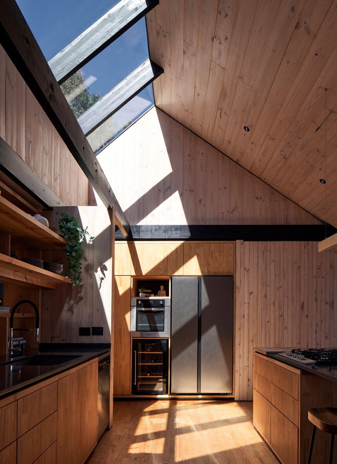 Photo 6 of 11 in A Surfer Couple Build an All-Black Off-Grid Cabin on a ...