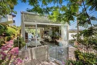 The All-Glass Home of the Artist Behind Obama’s "Hope" Poster Asks $4.6M