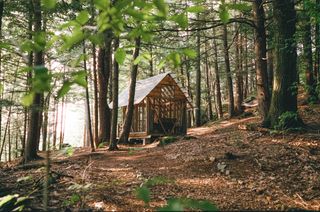 All It Took Was $3,000 and a Bit of Imagination to Bring This See-Through Vermont Cabin to Life
