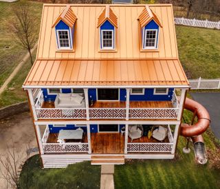 Sure, Why Not Build Your House With a 6,000-Pound Spiral Slide and a Glass Floor?