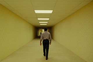 With Its Eerie Corporate Spaces, A24’s "Backrooms" Slashes Amnesiac ’90s Nostalgia
