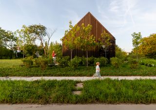 Her Multifamily Detroit Home Is Part Design Studio, Part Neighborhood Gathering Spot