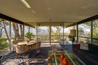 Enjoy sweeping vistas of the San Jacinto Mountain range and downtown Palm Springs just like Steve did. While you're at it, try contemplating the pattern of the rug by Edward Fields, if you can.