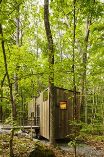 Forgo the Tent and Give a Tiny House a Test Drive - Photo 4 of 6 - The Isidore cabin sleeps four.