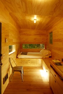 Forgo the Tent and Give a Tiny House a Test Drive - Photo 5 of 6 - The cabin comes equipped with board games and books.