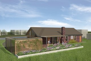 Additional garden boxes are installed off the rear facade. Photovoltaic panels top the carport, allowing future cost savings for the residents.