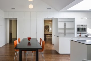In Leawood, Kansas, Forward Design | Architecture redesigned a kitchen and family room in a traditional home, creating a bright and minimalist space that takes cues from the residents' contemporary furnishings.