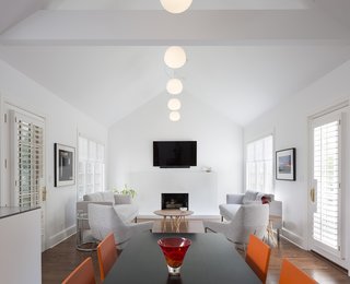 The renovation dramatically increased natural light in the rooms and replaced tired finishes with a modern palette.
