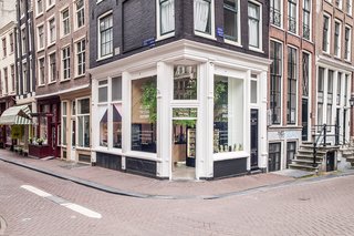 Many of Amsterdam's historic canal houses grow vibrant indoor gardens. Standard Studio wanted to create a similar feeling in a space that could be enjoyed by the public. Photo by Wouter van der Sar.