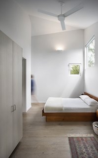 Highlighting the home's interesting geometry, the design team decided to use a range of window sizes and shapes throughout.