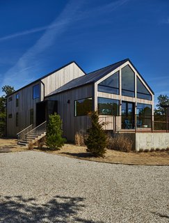 Western red cedar siding covers the home's exterior. 