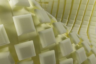 One of the key elements hidden within the mattress is their Support Balancing Technology, which is formed from functional shapes that enhance the feel of the surrounding memory foam and latex layers. Shown here is a close-up shot of the (patent) pending design, which helps ensure proper air flow and resists body impressions. This special SBT layer mimics the enhanced softness of memory foam without the confinement and sagging that conventional constructions are known for.