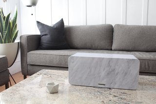 The Happy Plugs sound piece is shown here with the removable "marble" grill. It’s made up of a stretchy material that gives the look of stone, which easily snaps on and off of the front of the speaker. Photo by Amanda Vidmar 