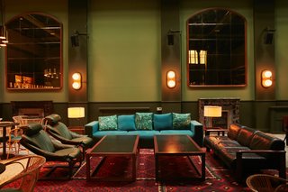 Along with taking part in designing the reception area, Marc Morro created the wood furniture in the bedrooms. Morro is one of the founders of AOO—a small company in Barcelona that designs and produces original furniture pieces that are made locally by themselves, artisans, or small manufacturers. Shown here is the lounge area of Libertine, the hotel’s bar that doubles as a restaurant. 