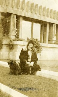 Shown here is Aline Barnsdall herself, lounging on the grounds of the Hollyhock House with her dog. The story of the residence could not be told without the powerful presence she held over the project. 