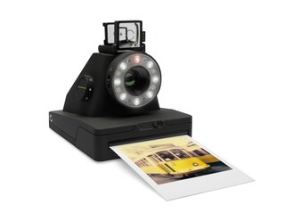 The modern version of the classic Polaroid silhouette is finished in a matte black surface with subtle yellow details. Impossible film packs are available in either colored or black and white and cost $19.99 for a pack of eight.