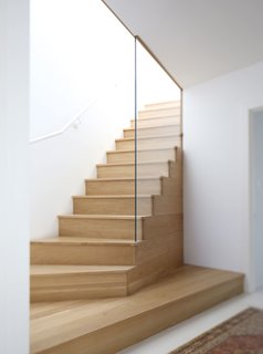 Dwell Home Tours Makes its Way to Portland - Photo 9 of 17 - Robinson built an airy wood stairway to bring more light up onto the second and third floors. The updated third floor looks out to views of Portland’s West Hills. 