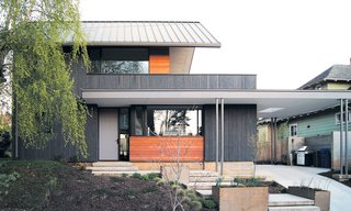 Dwell Home Tours Makes its Way to Portland - Photo 11 of 17 - The team used board-formed concrete and FSC certified framing lumber that they cleaned and reused to frame the house. During construction, they wanted to make sure they’d be able to install a green roof in the near future on the flat areas. To do this, they pre-engineered the desired sections in order to hold the weight. 