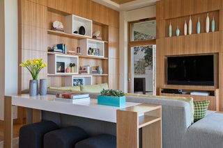 Dwell Home Tours Lands in Silicon Valley - Photo 8 of 15 - Throughout the house, you’ll find steel windows with wood cladding. Foldaway doors also make appearances throughout the residence, creating an open feel. The interiors were designed by Lorissa Kimm.