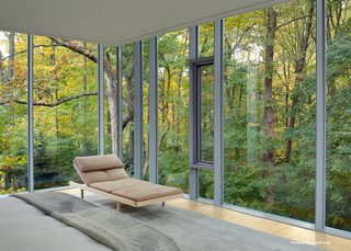 Marcel Breuer’s Revived Home Could be Yours for Just Under $5 Million - Photo 5 of 8 - In the master bedroom, Mori custom built a bed with side drawers and lined the space with windows that are outfitted with automatic curtains—both blackout and sheer.