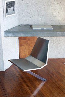 Throughout the house, we were shown a number of Lautner-designed details. Working with Goldstein, the architect was given the opportunity to design custom furniture pieces, which is something he didn’t normally get the chance to do. His angular, minimalist style was carried throughout—as shown here on a custom swivel desk chair that rotates directly from the floor of the bedroom.
