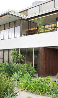 As seen today, the front facade of Neutra's VDL Studio and Residences in Silver Lake stands proud with a composition of clean lines, sharp angles, and reflective surfaces. The large amount of glass allows you to see directly through the house—further accentuating its relationship to the outdoors. Additionally, the automatic sun louvers that he designed allows the house to adapt to varying temperatures and levels of sun exposure. 