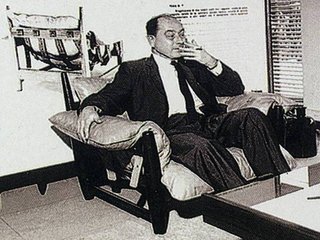 Everything You Need to Know About 6 of Our Favorite George Nelson Pieces - Photo 1 of 2 - George Nelson is shown here in 1965 sitting in a Sergio Rodrigues armchair in Rio. 