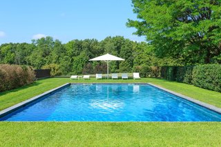 By following a pathway of Linden trees from the indoor pool, you’ll find yourself at the outdoor pool. 