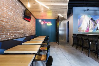A Popular Burger Joint Flaunts Its Roots With the Help of a Design Collective - Photo 2 of 8 - At the Chicago location, Project M Plus installed panels of custom wooden slats on the ceiling. The geometric shapes refer to the art of origami.