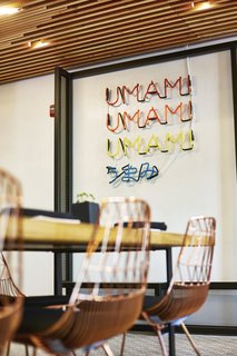 A Popular Burger Joint Flaunts Its Roots With the Help of a Design Collective - Photo 6 of 8 - For a lighthearted touch, Project M Plus created custom neon signs, which customers have been known to gravitate towards already. The copper chairs are by L.A.–based brand, Bend Goods.