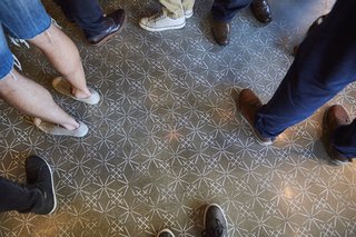 A Popular Burger Joint Flaunts Its Roots With the Help of a Design Collective - Photo 8 of 8 - The stenciled floor takes cues from Sashiko embroidery textile designs.