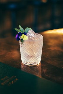 The on-site distillery allows the bar to serve one-of-a-kind gin blends alongside unexpected spirits including olive oil vodka and avocado. 