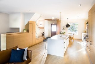 A Toronto-Based Firm Breathes New Life Into a Victorian’s Interior - Photo 3 of 3 - With an updated layout, the main living areas are connected into one welcoming space—while the homeowners can now enjoy an abundance of natural light from all corners. 