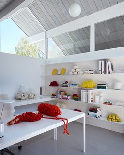 Same Bones, New Materials—A Double Gable Eichler Gets a Dashing Update - Photo 6 of 9 - Similar to certain Eichlers, the office looks through the courtyard and into the living room. Klopf Architecture made minor necessary adjustments to the windows but preserved the bulk of the clerestory areas. 