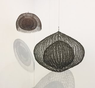 Based in New York, David Zwirner presented a hanging sculpture by Ruth Asawa (1926-2013), the internationally respected sculptor who first learned how to draw in a Japanese-American internment camp during World War II. Hailing from the 1980s, Untitled S.724 is a single-lobed hanging piece with four layers of continuous form within a form. Though it’s made of oxidized copper wire, it gives the impression of being soft and moldable. 