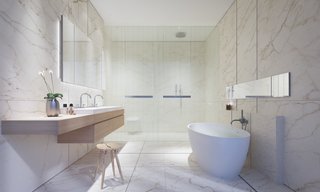 The master bathrooms will line the perimeter glass walls, which will ensure breathtaking skyline views. They’ll host Calacatta marble slabs, freestanding tubs, heated floors, and custom-designed white oak vanities. 