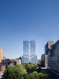 The double-tower, curved glass structure will be located in an area of the city that will bridge the gap between the traditional Soho neighborhood and its west section. Its strategic orientation will provide 360-degree views of the Hudson River, One World Trade Center, and much of Manhattan. 