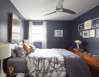 Located on the other side of the master bedroom (not seen here), is an extra closet they installed to house Carly’s vintage clothing collection. There are two other bedrooms on this upper floor. 