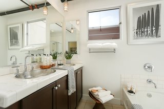 The space holds a total of two-and-a-half bathrooms, one of which is ADA-compliant. 