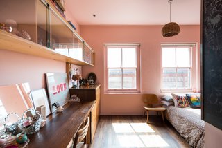 Formerly Home to an Artist and Knitwear Designer, a Commercial Space-Turned-Dwelling Hits the Market - Photo 9 of 10 - The second floor holds two bedrooms, including a room that has a "windowed cockpit," which Brinkworth designed for the owners’ children to look out over the garden. 
