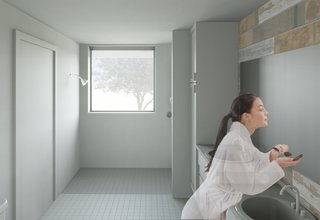 The bathroom was designed with an open layout to provide enough space for someone in a wheelchair to operate comfortably.