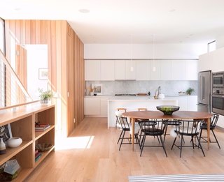The natural and warm material palette creates coziness and warmth within the space. 