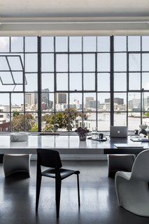 Hollis’ team opened the space by removing multiple walls and preserving the original steel windows and high ceilings. The views stretch from the Bay Bridge to Twin Peaks.