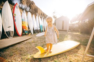 Indoek’s New Book Shares a Glimpse Into the Homes of Creative Surfers - Photo 5 of 11 - Grant Ellis has been a photo editor at Surfer Magazine for 13 years and lives in a quaint beach shack in Cardiff, California, with his wife Julie, son Ethan, and daughter Kaia (shown here).